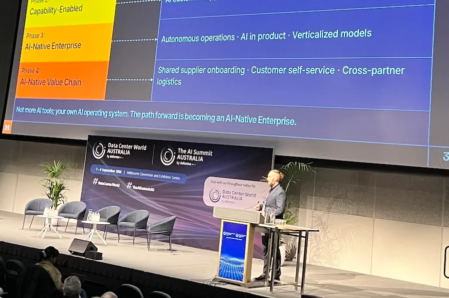 Corentin Petit, Mistral AI's global solutions director, opened the second morning with a four-stage maturity model